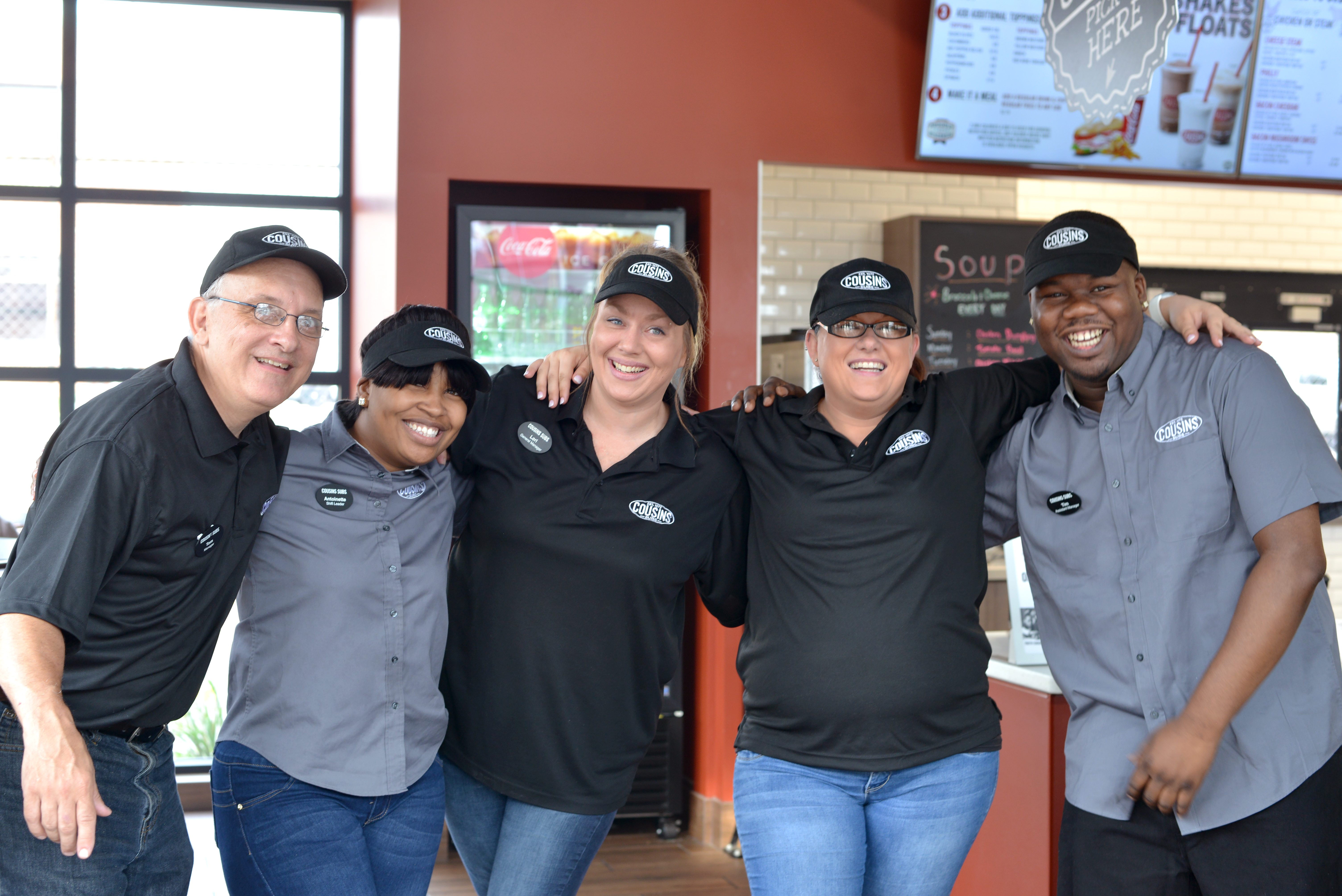 Team working at Cousins Subs