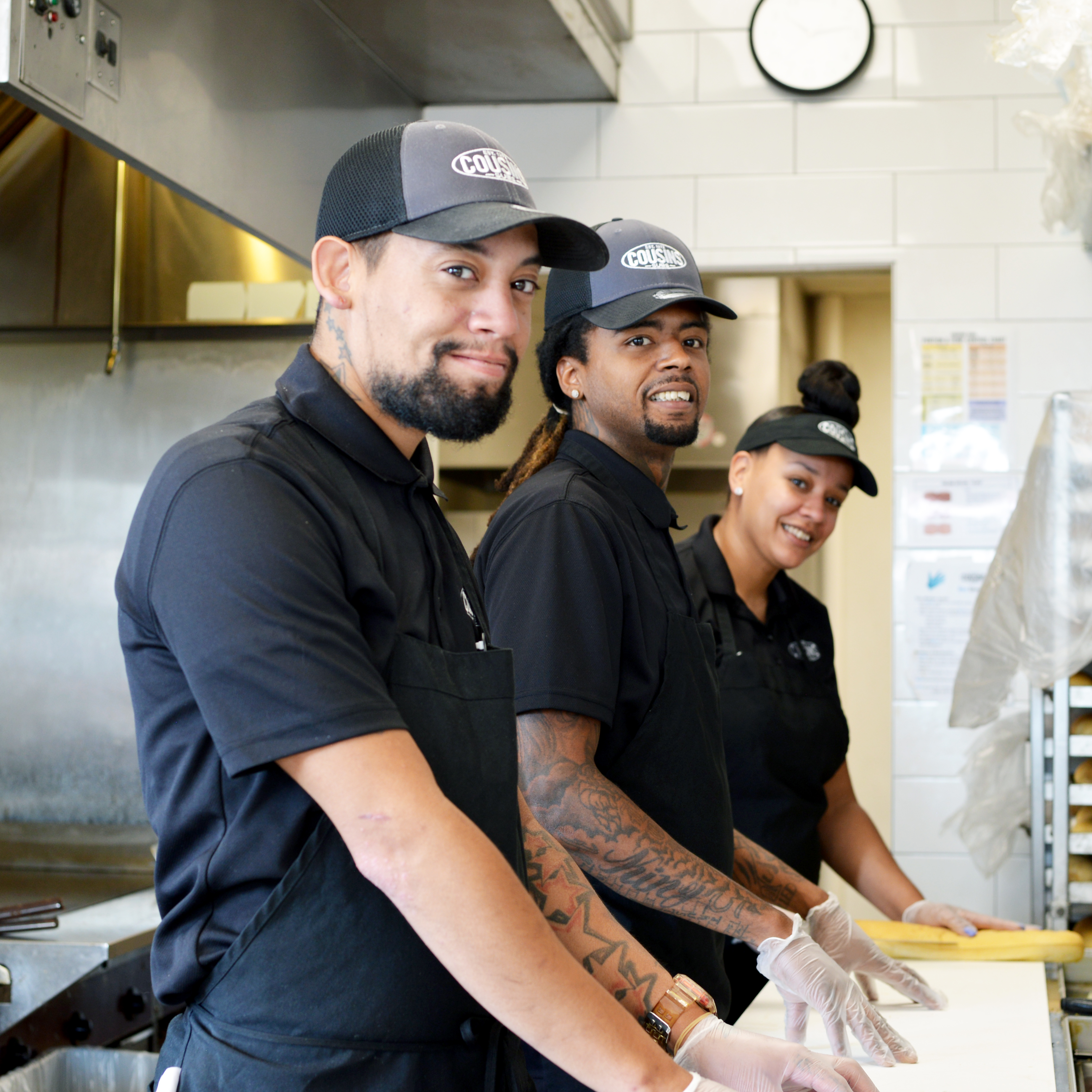 Team working at Cousins Subs